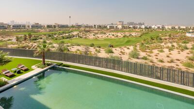 The pool backs out on to the fairways of the Dubai Hills Golf Club. Courtesy Luxhabitat Sotheby's International Realty