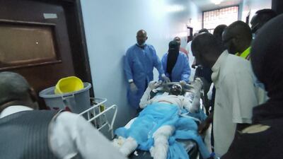 Casualties from a fuel lorry explosion in Bent Bayya, Libya, are admitted to a hospital in the city of Sebha for treatment. AFP