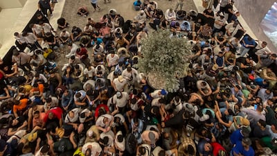 People queue for the iPhone 15 at Mall of the Emirates in Dubai. Antonie Robertson / The National