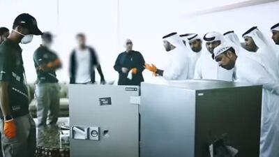 Police inspect the broken safe in an apartment in City Walk. Courtesy: Dubai Police