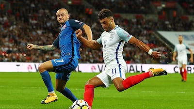 Alexander Oxlade-Chamberlain, right, seen here in action for England during their recent 2018 World Cup qualifier against Slovakia. The midfielder is in line to make his Liverpool debut against Manchester City. Neil Hall / EPA
