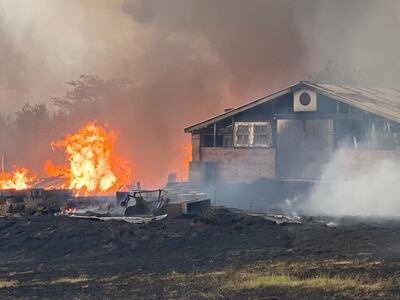 A view of Clarah Brooks' brother in law's house as it was engulfed by flames from a bushfire in southern Australia. Courtesy Clarah Brooks