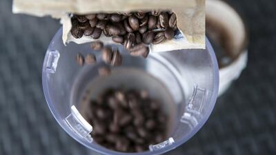 Step 1: Grind the organic coffee beans, amount to your liking. Silvia Razgova / The National
