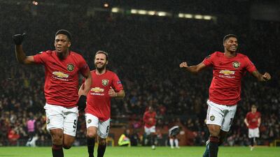 Manchester United's Anthony Martial, left, after scoring the second. AFP
