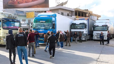 Lebanese lorry drivers block the road on the Lebanon's side of the Masnaa-Jdaidt Artouz border crossing on February 10 in protest against Syria's decision to ban the entry of non-Syrian cargo vehicles. AFP