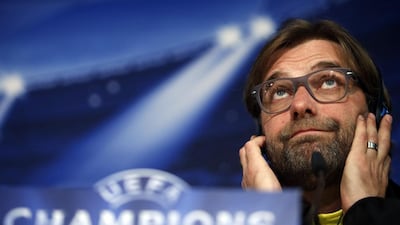 Borussia Dortmund manager Jurgen Klopp reacts during a news conference at the Santiago Bernabeu stadium in Madrid on Tuesday. Borussia Dortmund will face Real Madrid at their Champions League quarter-final first leg match on Wednesday. Susana Vera / Reuters / April 1, 2014