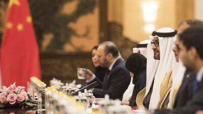 Sheikh Mohammed bin Zayed, Crown Prince of Abu Dhabi and Deputy Supreme Commander of the Armed Forces speaks to Chinese President Xi Jinping (unseen) during a signing ceremony at the Great Hall of the People in Beijing, China. Fred Dufour / EPA / Pool Pool