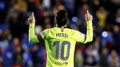 Lionel Messi celebrates after making it 3-0. EPA