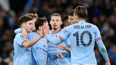 Manchester City's Julian Alvarez celebrates with teammates after scoring the second goal in the 2-0 League Cup win against Chelsea at Etihad Stadium on November 9, 2022. Getty