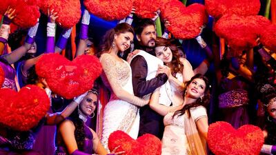 Shah Rukh Khan with Deepika Padukone, left, Madhuri Dixit, right and Jacqueline Fernandez, far right. Victoria Vinnikava for The National