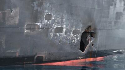 The hole in the hull and blast damage on the starboard side of the Japanese-owned Kokuka Courageous.