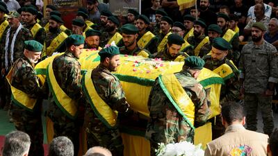 Pallbearers carry the coffin of Hezbollah member Ali Mohamed Chalbi, after hand-held radios and pagers used by the group were detonated across Lebanon. Reuters
