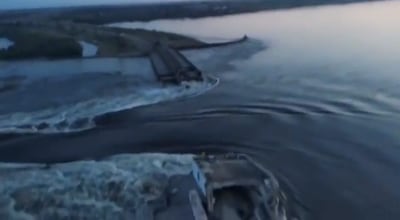 Water surges through a gap allegedly blown up by Russia in the Kakhovka dam in Kherson region, southern Ukraine. EPA