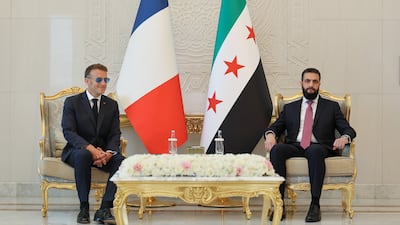 Syrian President Ahmad Al Shara, right, meets French President Emmanuel Macron at the People's Palace in Damascus on Tuesday. EPA