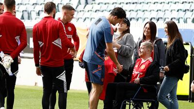 Harry Maguire of Manchester United greets a fan during a Manchester United training session at the WACA. Getty Images