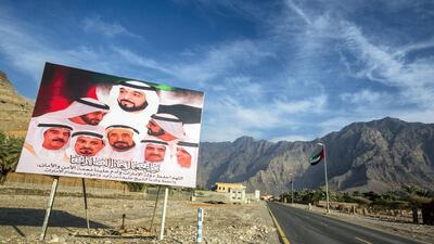 UAE flags and signs up for UAE National Day.