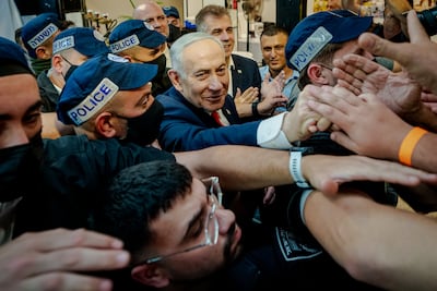 Israeli Prime Minister Benjamin Netanyahu campaigns at Hatikva Market in Tel Aviv, Israel, on October 22. Getty Images