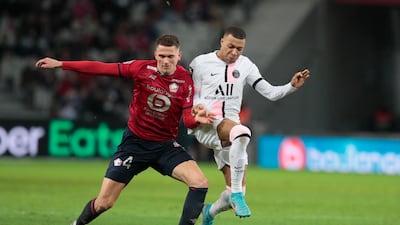 Sven Botman challenges Kylian Mbappe during the Ligue 1 match between Lille and Paris Saint Germain. AP
