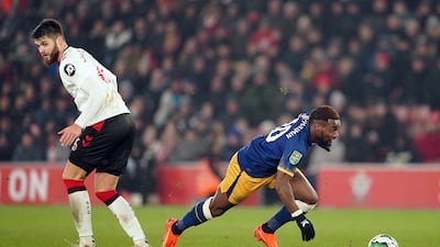 Southampton's Duje Caleta-Car fouls Allan Saint-Maximin, and is shown a red card. PA