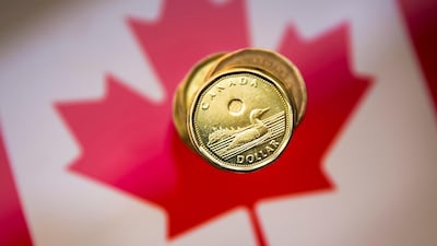 The Canadian dollar, commonly known as the loonie, weakened against the US dollar before later recovering despite Fitch Ratings stripping the country of its AAA sovereign debt rating. Reuters