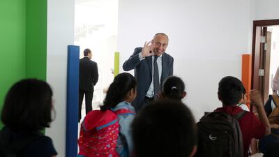 James Lynch , Principal saying good bye to the students after the school break at the Ambassador International Academy in Dubai. Pawan Singh / The National