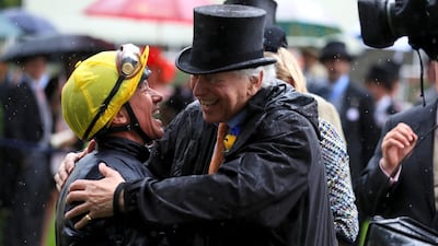 Jockey Frankie Dettori and qwner Evelyn de Rothschild celebrate after the Italian won the Prince of Wales's Stakes with Crystal Ocean. Press Association