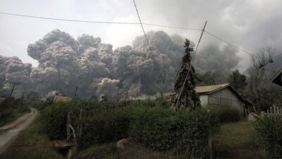 The volcano on the western island of Sumatra started erupting in September but on Saturday spewed hot rocks and ash 2,000 metres (16,00 feet) into the air, blanketing the surrounding countryside with grey dust. Chaideer Mahyuddin / AFP Photo