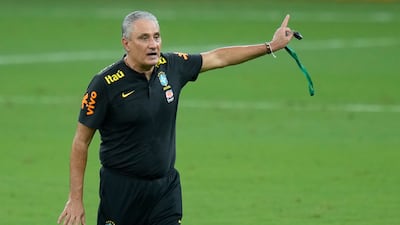 Brazil coach Tite gives instructions to his players. AP Photo