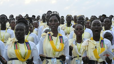 Members of the choir sing. AFP
