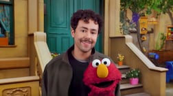 Ramy Youssef and Elmo on Sesame Street. Screenshot