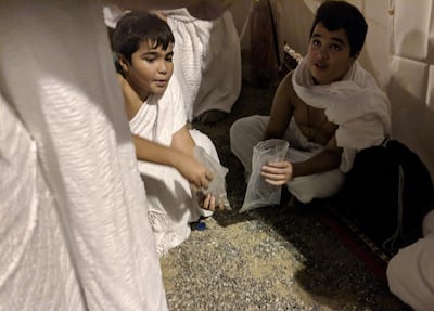 Pilgrims gather pebbles