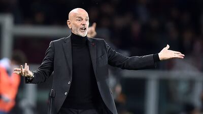 Stefano Pioli's AC Milan are two points clear of Inter Milan at the top of Serie A. EPA