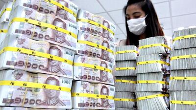 The Thai government floated the baht in 1997 after failing to protect the currency from speculative attacks. Sukree Sukplang / Reuters