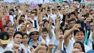 A migrant-rights group is encouraging Filipinos living and working abroad not to send remittances on September 19 to protest against the misuse of government funds. AFP Photo / Ted Aljibe