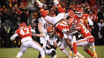 Cincinnati Bengals wide receiver Trenton Irwin is brought down by several Kansas City Chiefs players. EPA