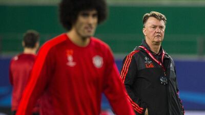 Manchester United manager Louis van Gaal watches Marouane Fellaini during the team’s training session in Wolfsburg on Tuesday night. John MacDougall / AFP