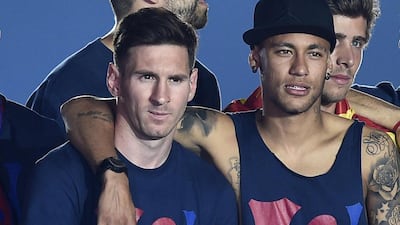 Lionel Messi and Neymar shown during Barcelona's celebration for winning the European Cup at the Camp Nou on Sunday. Josep Lago / AFP / June 7, 2015