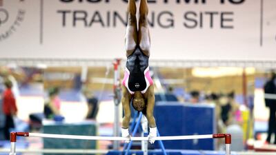 In this 2015 file photo, gymnast Simone Biles trains in Texas. Biles wrote on Twitter about the abuse committed by Larry Nassar. David J. Phillip / AP