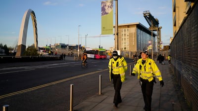 Police patrol outside the summit's venue. AP Photo