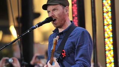 Jonny Buckland of Coldplay. Stephen Lovekin / Getty Images / AFP