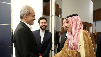 Iran's President Masoud Pezeshkian, left, meets Saudi Arabia Foreign Minister Prince Faisal bin Farhan in Doha, Qatar. Reuters