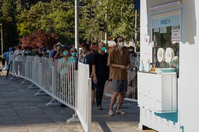 People queueing for a Covid-19 test in Beijing. EPA
