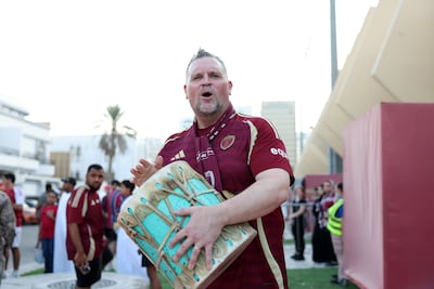Wolfie drums up support ahead of a game between Al Wahda and Al Duhail at Al Nahyan Stadium. Chris Whiteoak / The National