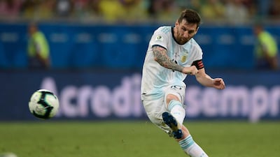 Argentina's Lionel Messi takes a free kick. AFP