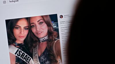 A picture posted on Instagram on November 14 last year by Sarah Idan, who held the title Miss Iraq, seen taking a selfie with Adar Gandelsman, a Miss Israel. The caption reads: 'Peace and Love from Miss Iraq and Miss Israel #missuniverse'. AFP
