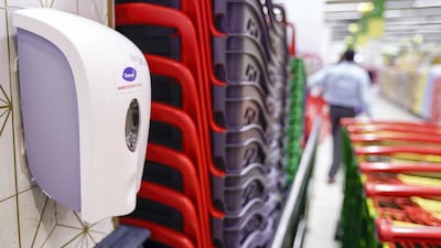 Shoppers will find additional hand sanitiser stations located throughout malls in the UAE. Victor Besa / The National