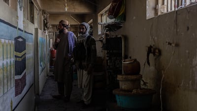 The Kaaba is painted onto the walls of the Pul-e-Charkhi prison. Stefanie Glinski for The National