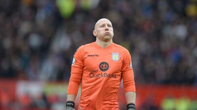 Aston Villa’s US goalkeeper Brad Guzan reacts during the Premier League football match between Manchester United and Aston Villa at Old Trafford in Manchester, north west England, on April 16, 2016. AFP / OLI SCARFF