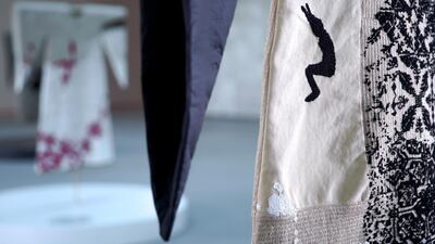 Detail from the 'Leap of Faith' thobe, where one young man is suspended in mid-air. Victor Besa/The National