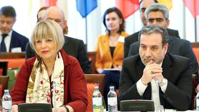 Iran's top nuclear negotiator Abbas Araqchi and Secretary General of the European External Action Service Helga Schmit attend a meeting of the JCPOA Joint Commission in Vienna, Austria. Reuters